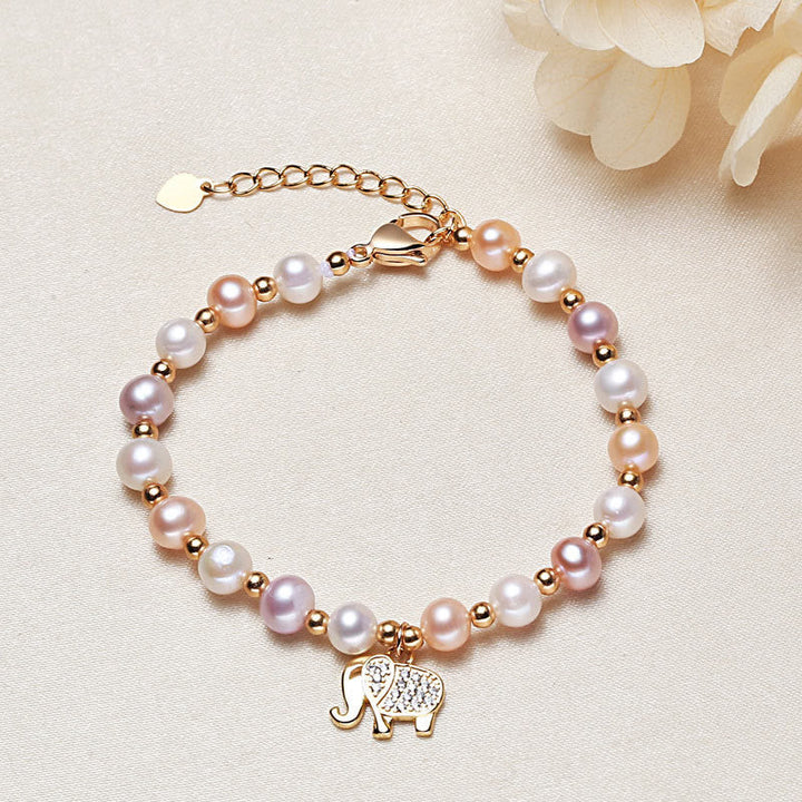 Armband Perle Elefant rosegold mit bunten Perlen und Elefantanhänger.