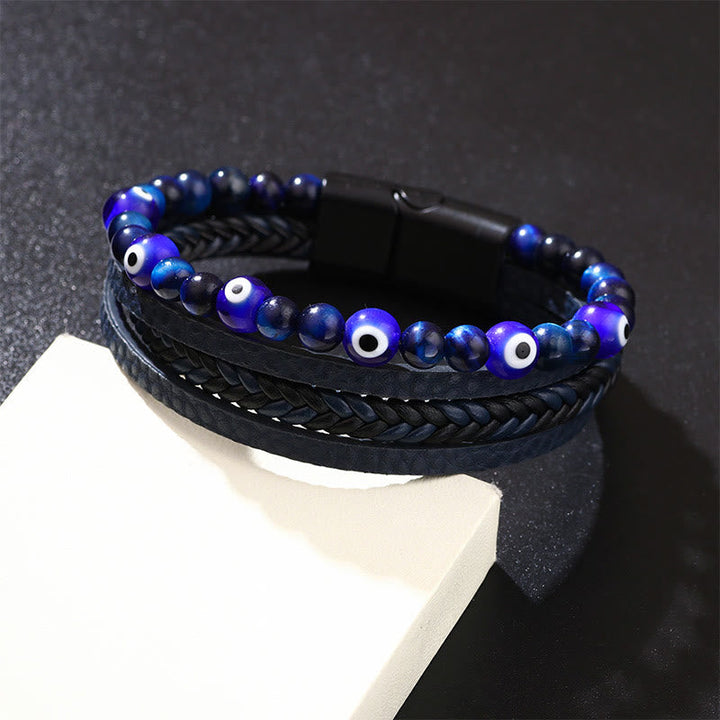 Armband mit blauen Perlen und Böses Auge Motiv schwarzes Lederband