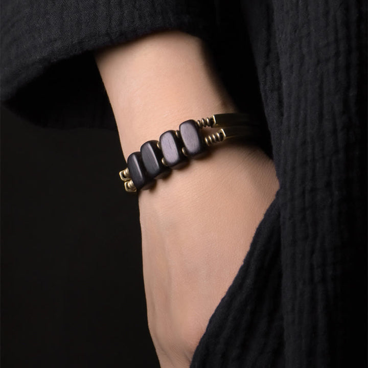 Armband Kupfer Ebenholz Balance Energie Handgelenk schwarze Perlen elegant