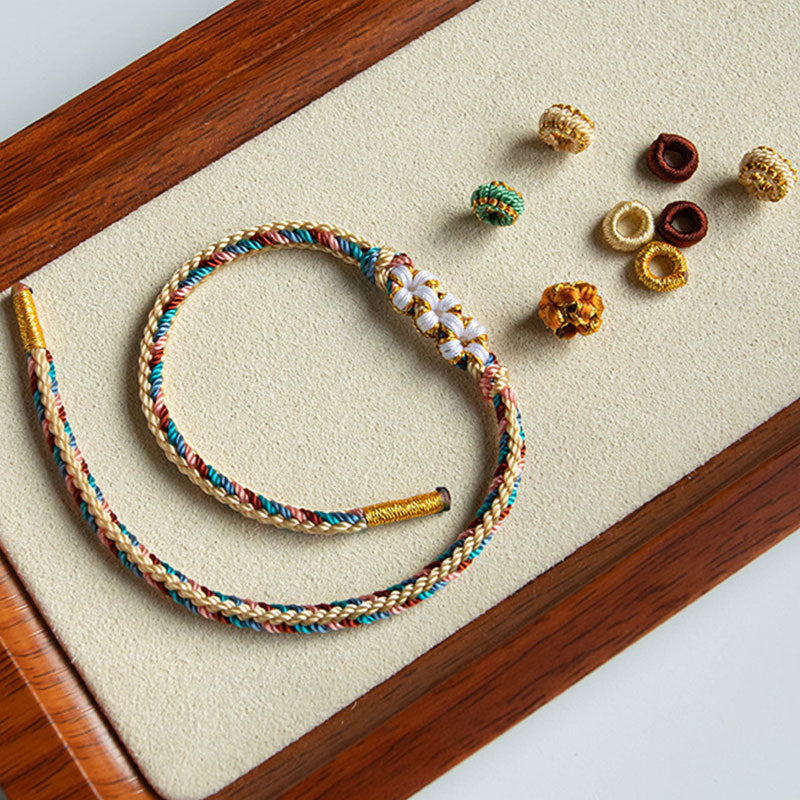 Buntes Armband Pfirsichblüte mit goldenen Perlen Schmuckset.