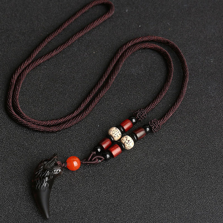 Anhänger Obsidian Wolf Mut Schutz schwarzer Stein Kette Natur