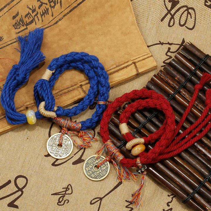 Rotes und blaues Armband Berg Ghosts Spend Money mit Münzen.