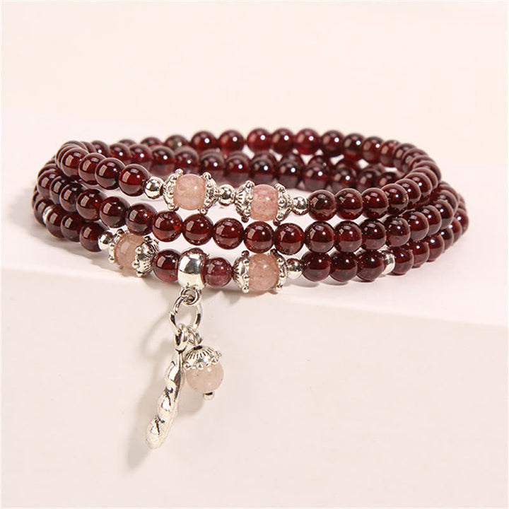 Armband Erdbeerquarz Granat mit silbernen Perlen und Anhänger elegantes Design