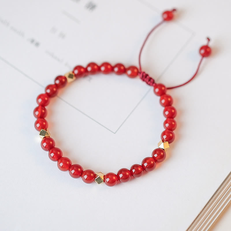 Rotes Achat Armband mit goldenen Perlen elastisch Makramee Verschluss