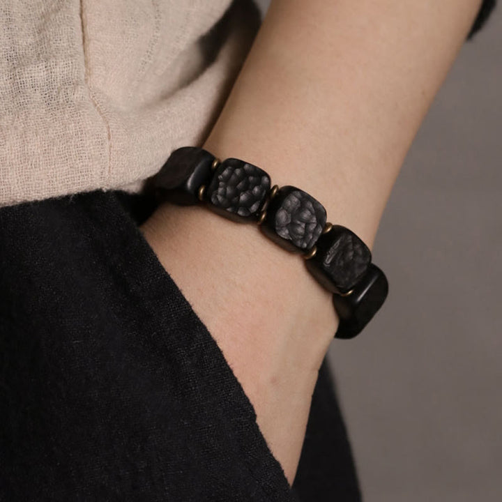 Armband Kupfer Ebenholz Frieden Balance schwarze Perlen Handgelenk getragen