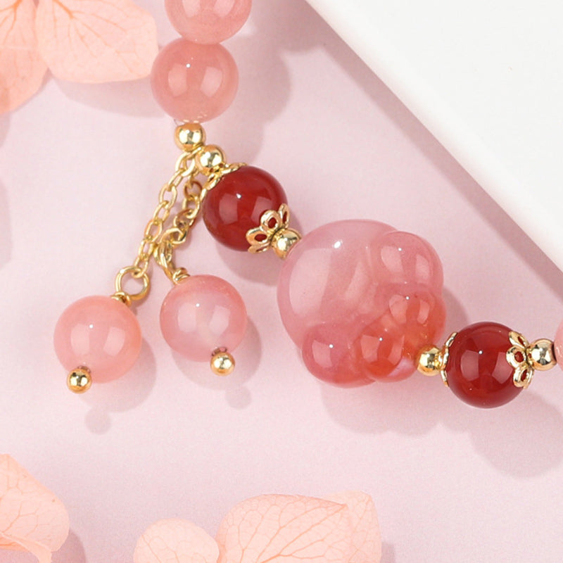 Armband Achat Katze rosa rote Perlen goldene Verzierungen elegant.