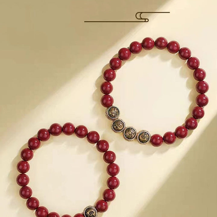 Rotes Zinnober Armband 925 Silber elegante Perlen Naturstein getragen