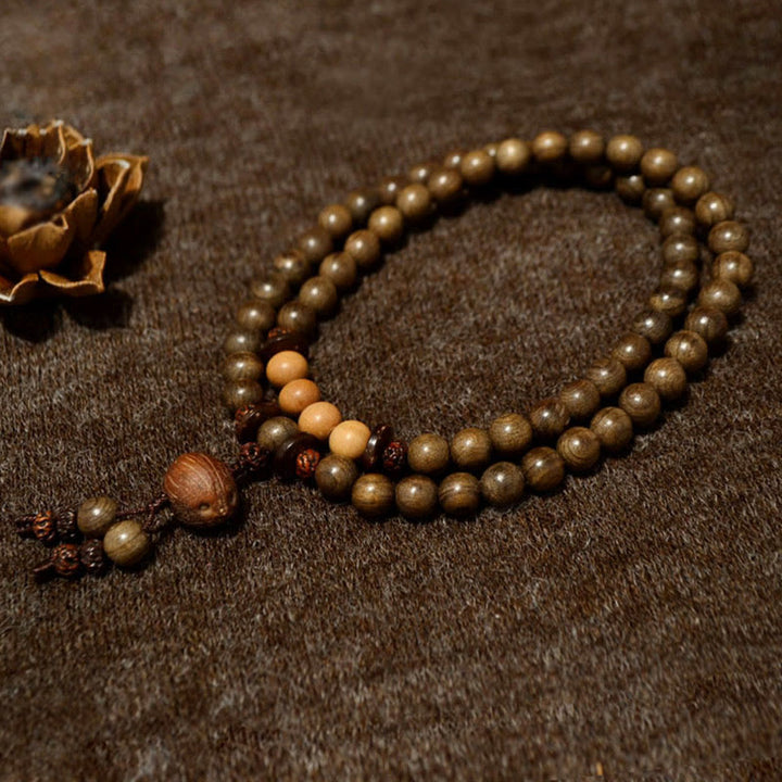Mala Sandelholz – Schutz Armband mit bronzefarbenen Perlen Naturstein