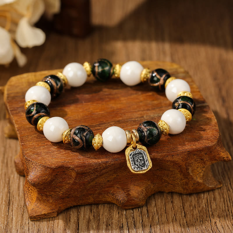 Armband – Schutz & Wohlstand & Balance weiße Perlen schwarze Steine Anhänger