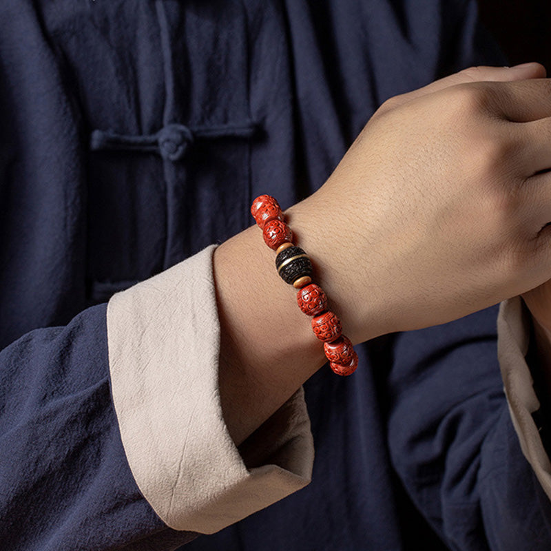 Armband Zinnober Ebenholz – Segen & Ruhe elastisch getragen Handgelenk