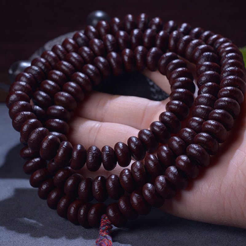 Mala 108 Perlen Bodhi Wohlstand braun elastisch Handgelenk getragen