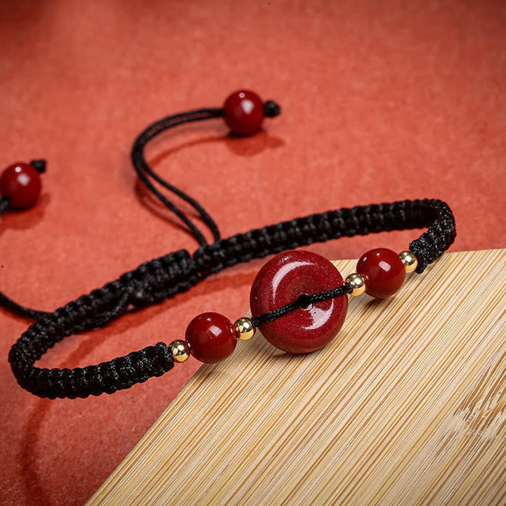Armband Zinnober – Frieden & Segen rotes Perlenarmband mit schwarzem Makramee elastisch