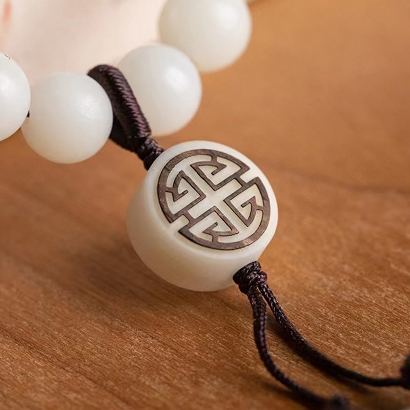 Armband Sandelholz Bodhi – Energie weiße Perlen Schnur braun