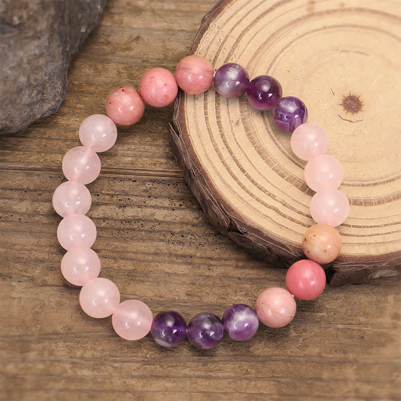 Mala Rosenquarz Amethyst Armband mit rosa und violetten Heilsteinen.