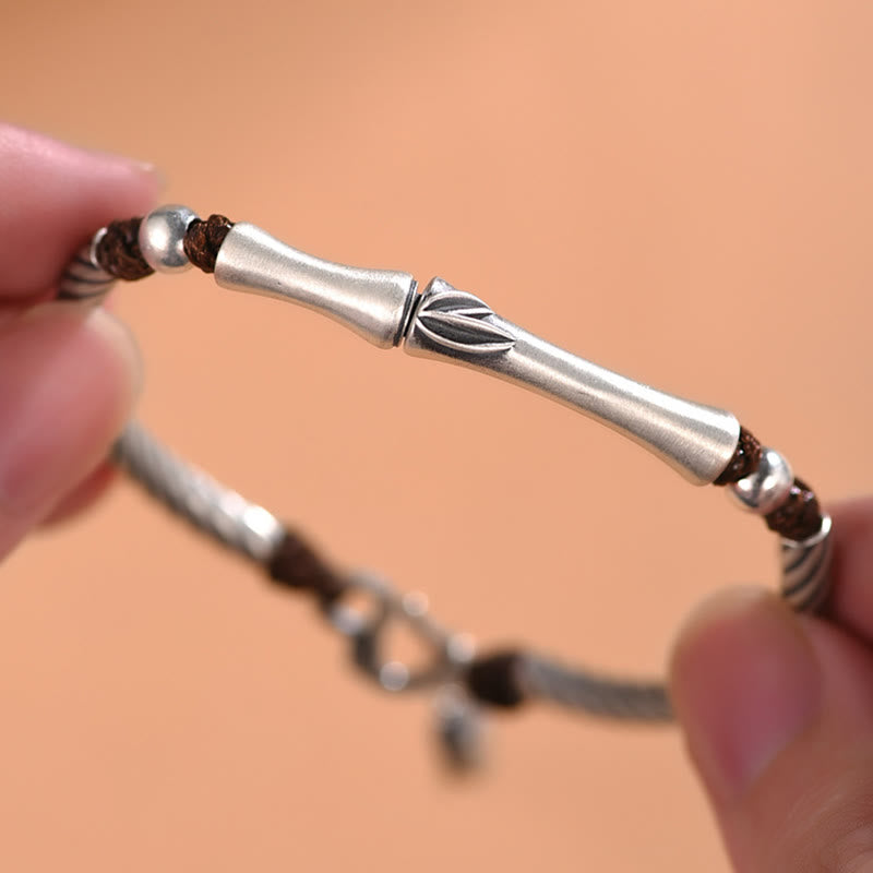 Silberarmband 925 mit Bambus-Design, Glück und Wohlstand fördernd, elegant getragen.