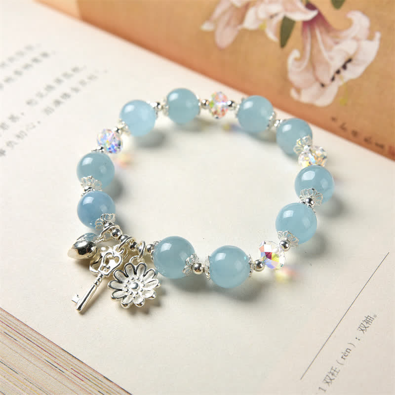 Aquamarin Armband 925 Silber mit Blütenanhänger elegant getragen