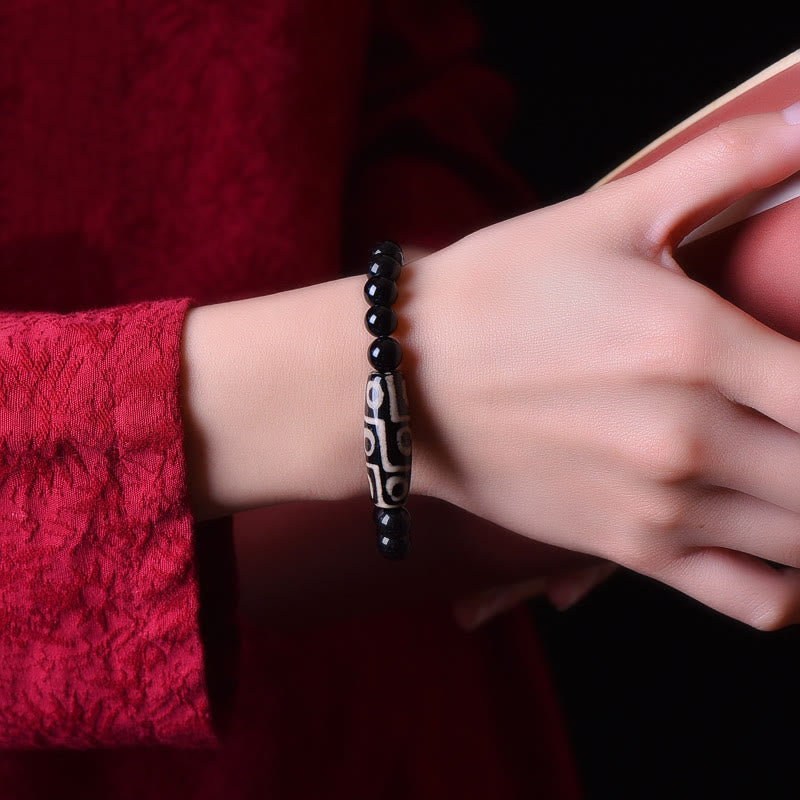 Armband – Wohlstand Energie schwarze Perlen Naturstein elastisch Handgelenk getragen