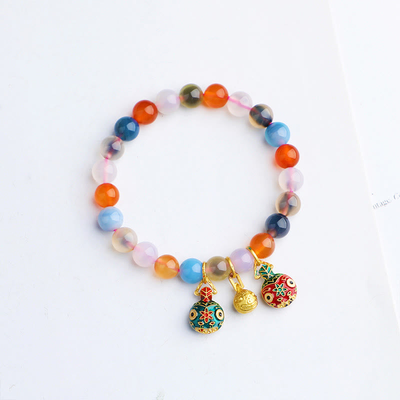 Armband Achat – Harmonie mit bunten Steinen und goldenen Anhängern.