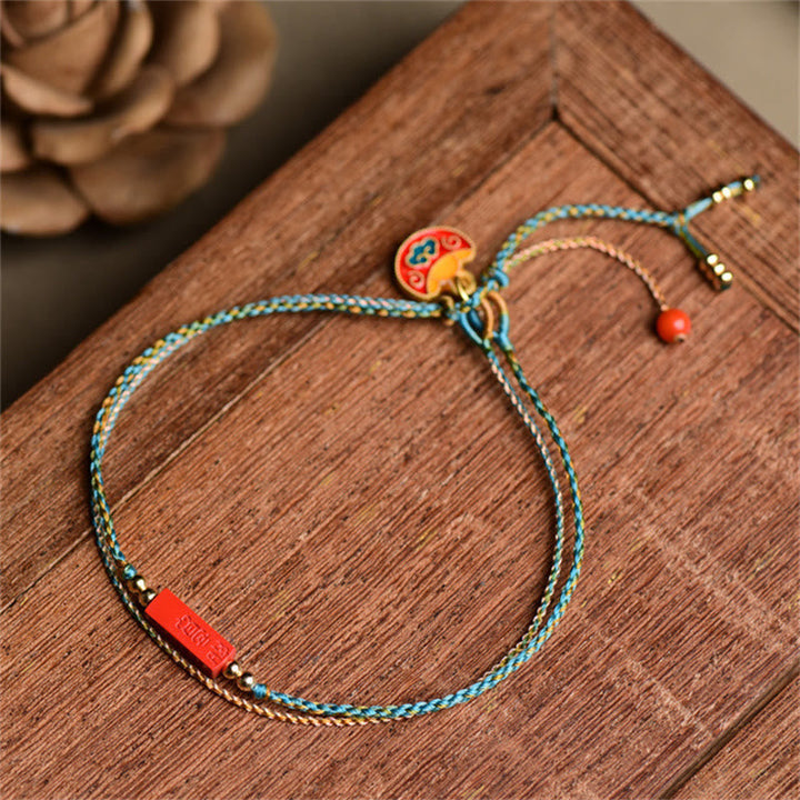 Armband Zinnober – Segen & Balance mit türkisen Fäden Naturstein