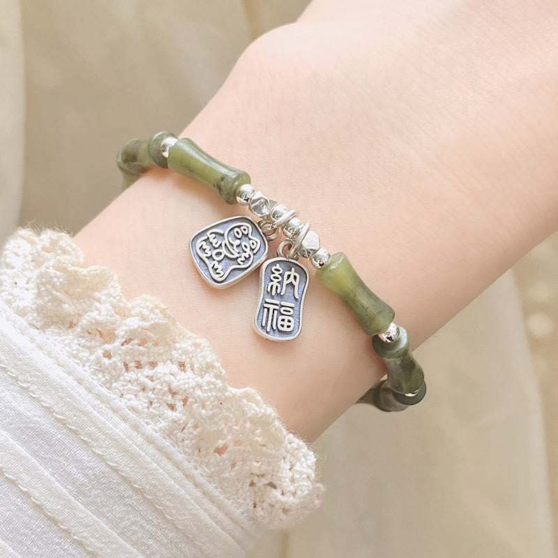Jade Armband 925 Silber Fu-Zeichen Glück Fülle Naturstein elastisch getragen