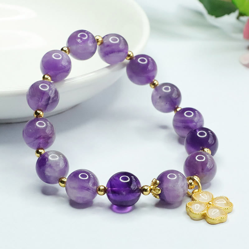 Amethyst Kristall Armband Kleeblatt Charm violette Natursteine Goldperlen elastisch.