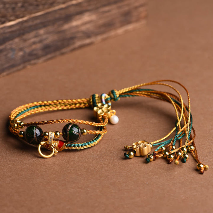 Obsidian Pixiu Armband mit goldenen Perlen und grünem Seidenfaden Heilung Stärke