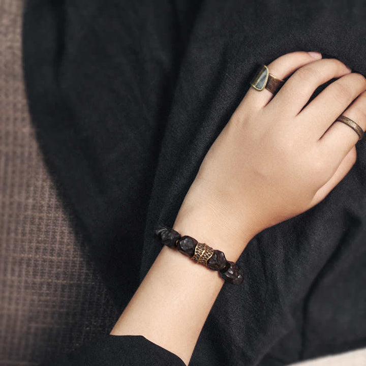 Armband Kupfer Ebenholz Paar schwarze Perlen Naturstein elegant getragen