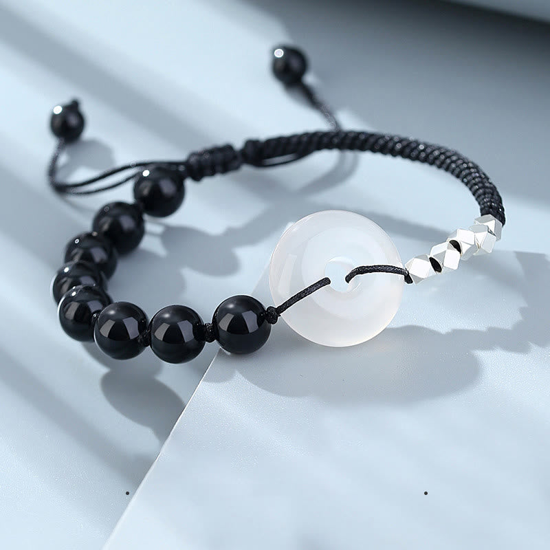 Armband mit schwarzem Obsidian und weißem Mondstein elegantes Design
