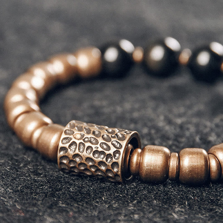 Armband Obsidian Kupfer mit strukturiertem Perlendesign Heilung