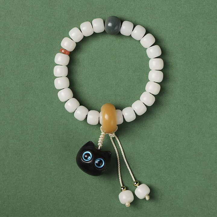 Bodhi Armband mit weißen Perlen schwarzer Katze Anhänger Liebe Frieden