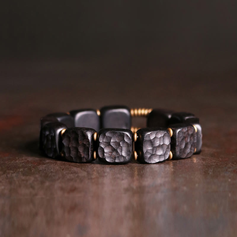 Armband Kupfer Ebenholz mit strukturierten Perlen elegantes Design schwarz