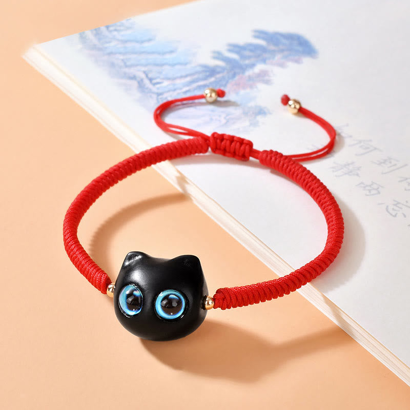 Armband Ebenholz Katze rotes Seil blaue Augen Frieden elastisch