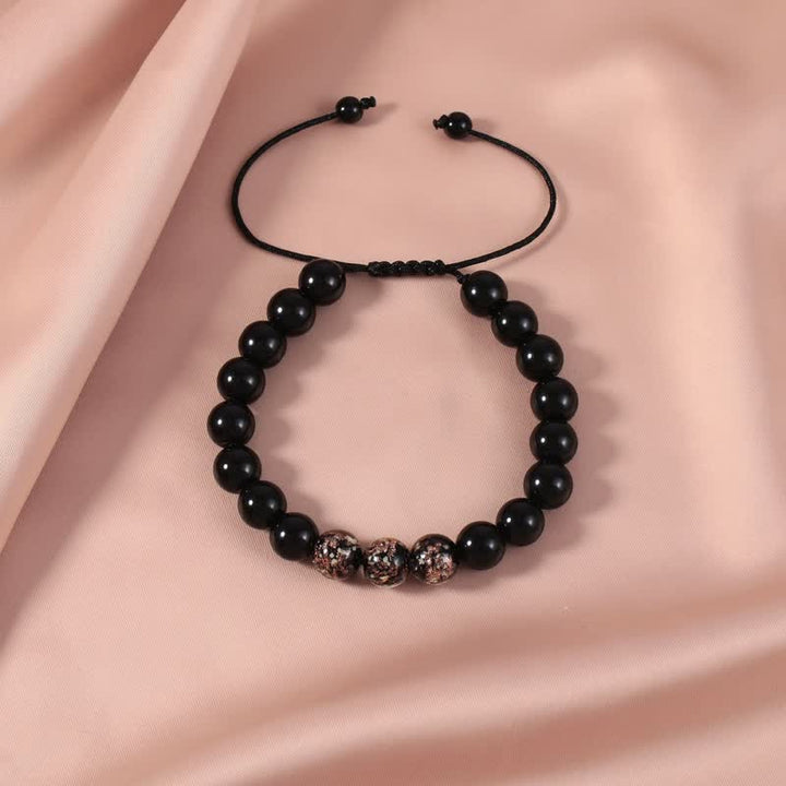 Armband Schwarzer Obsidian – Stärke mit silbernen Perlen elegant gestylt