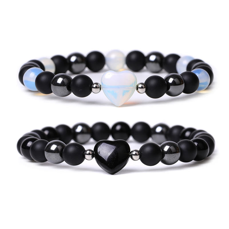 Armband Schwarzer Onyx Tigerauge mit Herz Anhänger elegant gestaltet.