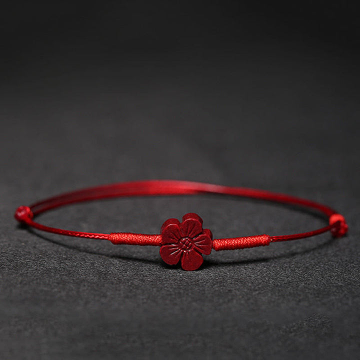 Rotes Armband Zinnober Koi Fisch mit Blütenanhänger Liebe Segen elastisch