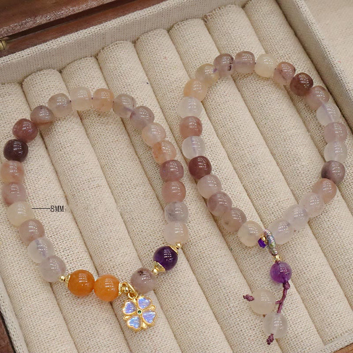 Jade Armband Wohlstand mit rosa Steinen und Anhänger elegant.