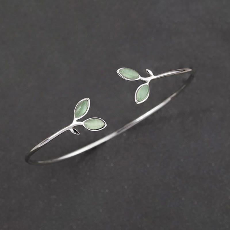Armband Blatt Katzenauge silbern grüne Steine elegantes Design.