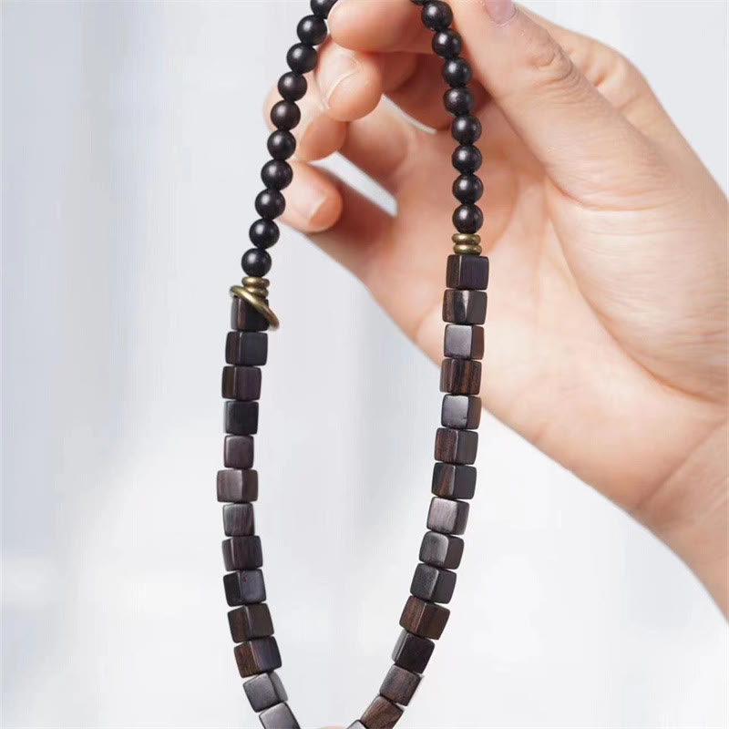 Armband Ebenholz – Frieden mit schwarzen Perlen und Würfeln Holz