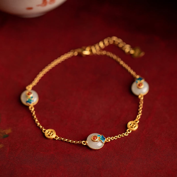 Jade Glückswolken Armband golden Perlen Glück Handgelenk elegant getragen