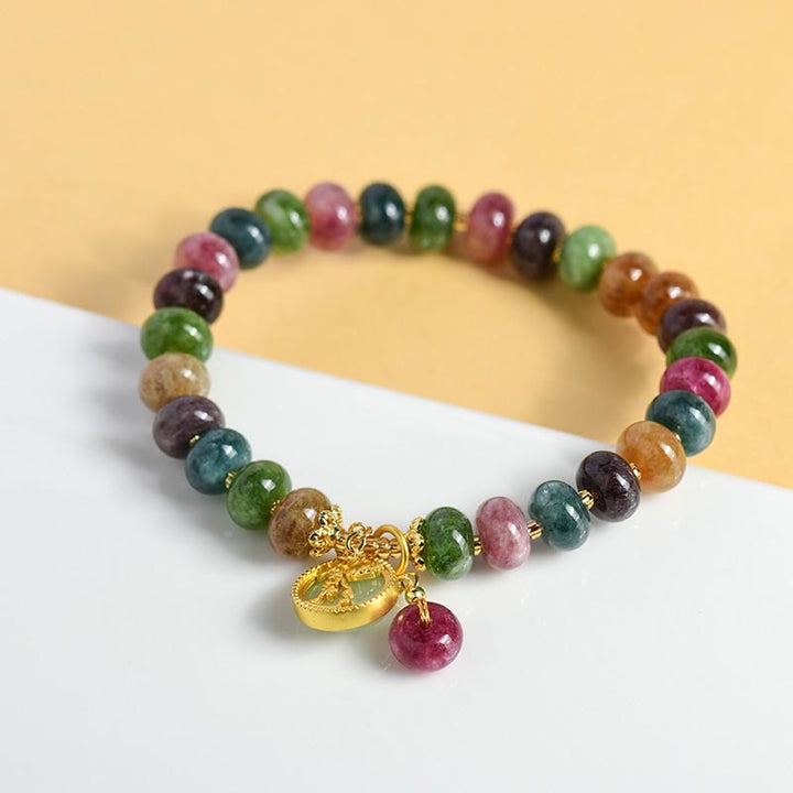 Buntes Turmalin Armband mit goldener Blume Hase Anhänger elastisch