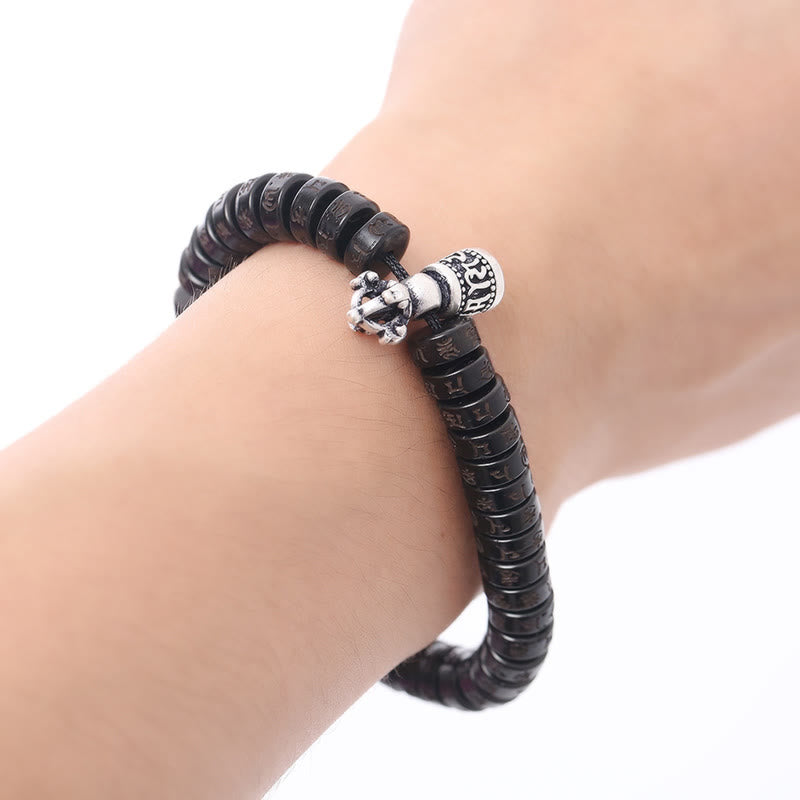 Schwarzes geflochtenes Armband mit silbernem Om Mani Padme Hum Verschluss eleganter Look