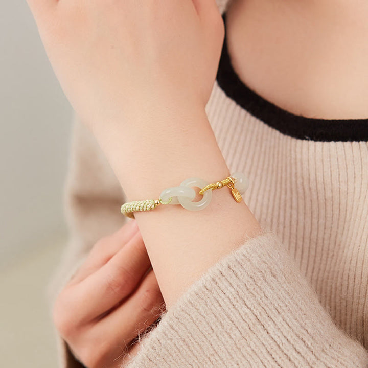 Jade Fu-Zeichen Armband Frieden Fülle goldfarben elastisch getragen Handgelenk