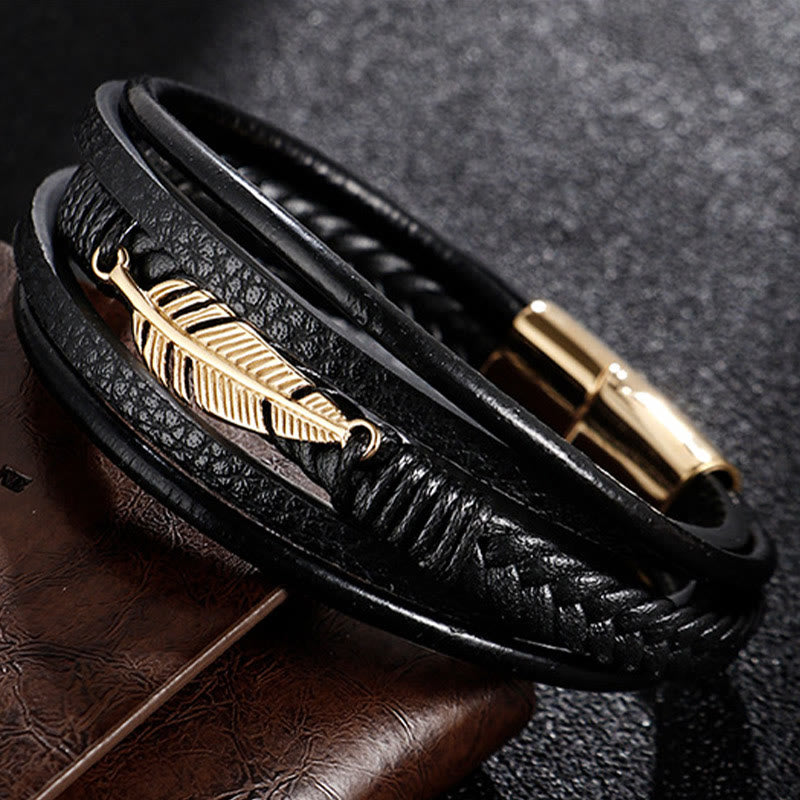 Schwarzes magnetisches Armband mit goldenem Feder-Design Armband Magnetisch – Ruhe