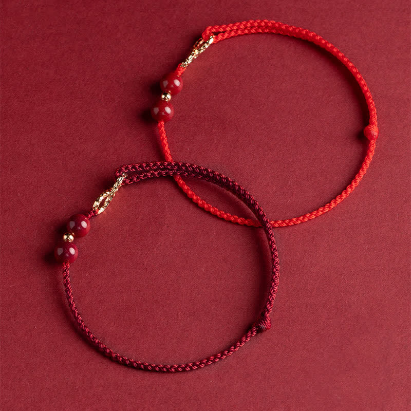 Armband Rotes Band Gold Infinity Symbol