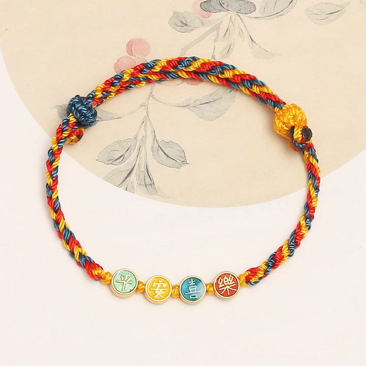Armband – Schutz & Frieden mit buntem Seil und chinesischen Münzen.