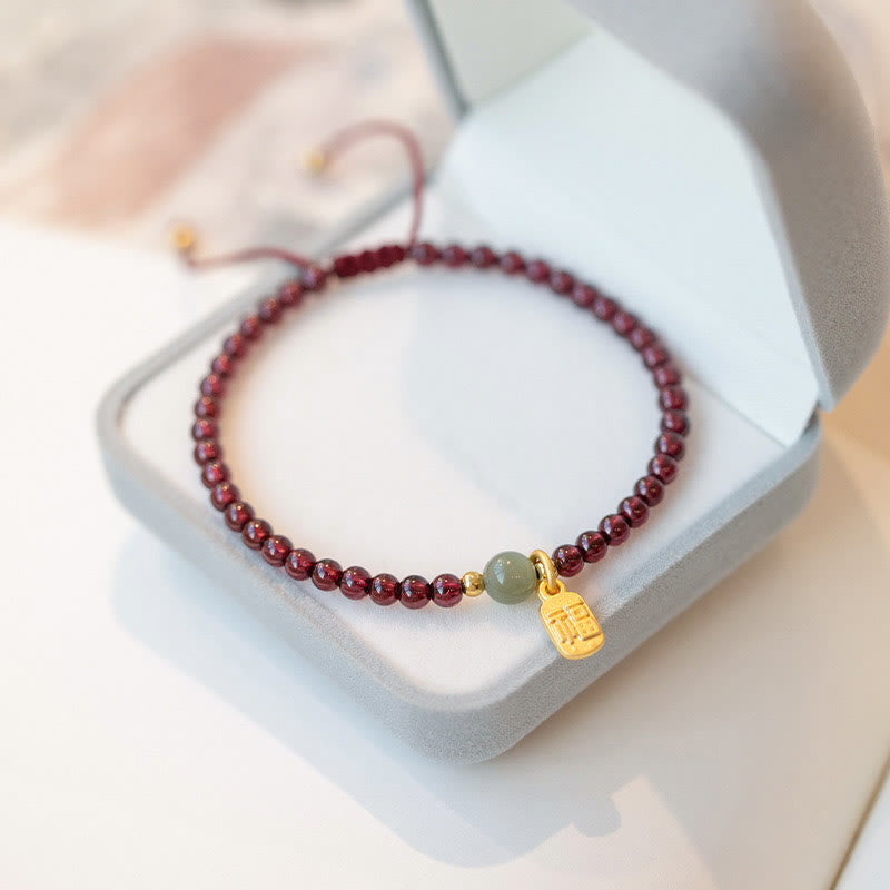 Armband Erdbeerquarz Granat Fu-Zeichen – Glück & Heilung – Bild 10