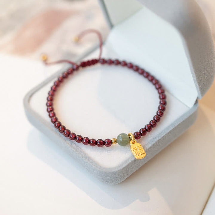 Armband Erdbeerquarz Granat Fu-Zeichen – Glück & Heilung – Bild 10