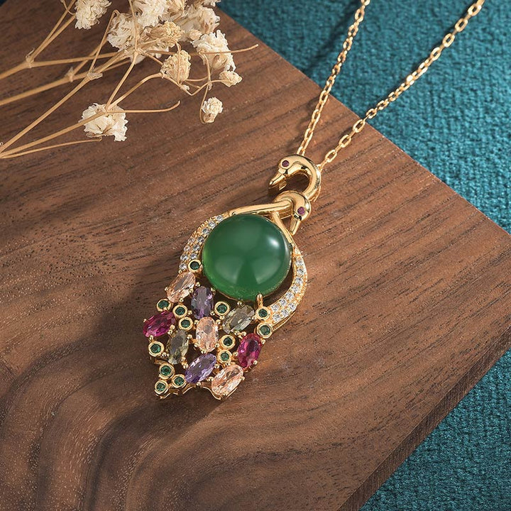 Anhänger Kette Cyan Jade Pfau Erfolg goldfarben Edelsteine