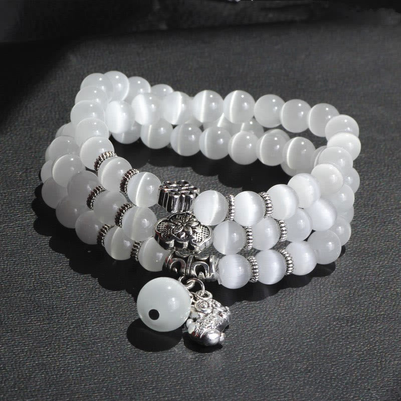 Weißes Katzenauge Armband PiXiu Dreifach Silber elastisch Naturstein.