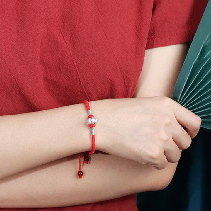 Rotes Armband 925 Silber Chinesisches Tierkreis am Handgelenk getragen Glück Stärke
